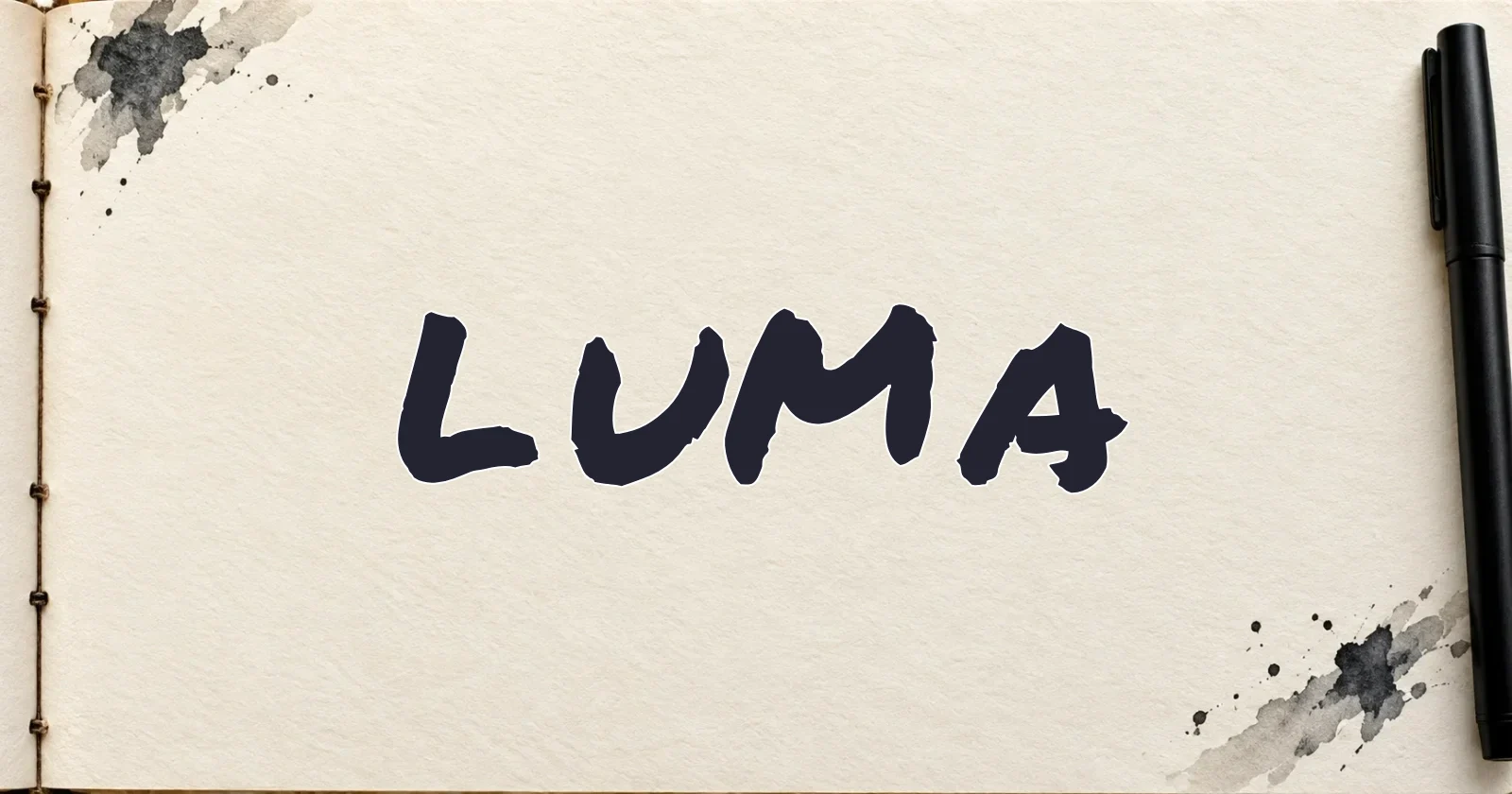 LUMA marker lettering on a warm ivory sketchbook page