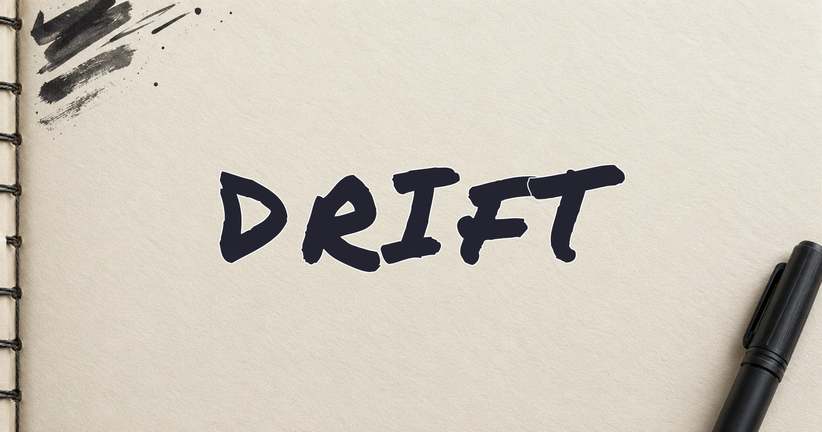 DRIFT in dark marker lettering on ivory sketchbook paper